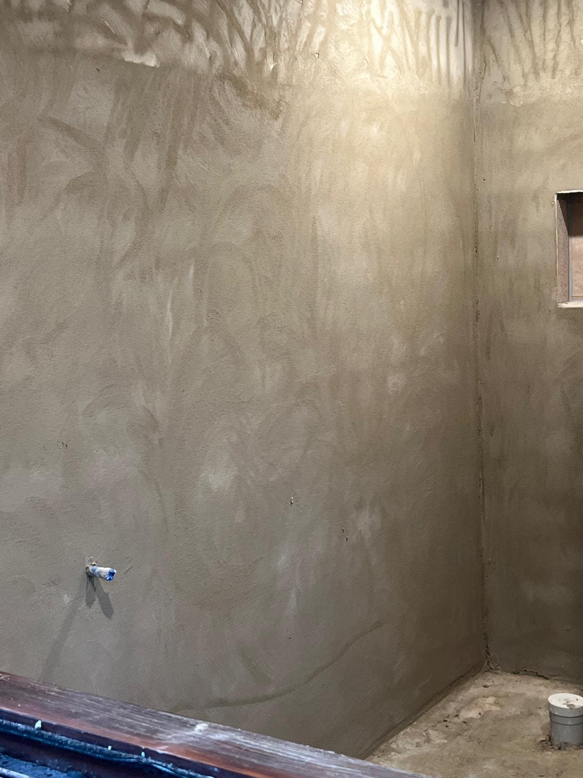 Bathroom walls in a Sydney home rendered flat and true, ready for waterproofing and tiling
